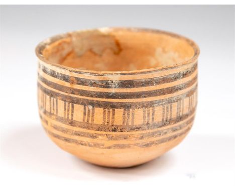 Indus Valley Bowl, 3rd-2nd millennium BC  A ceramic bowl with small rim and drum shaped body decorated with horizontal lines 