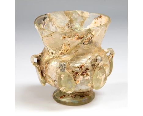A blown colourless glass mosque lamp with applied threading, hooks and impressed bosses, also incolourless glass; flared mout