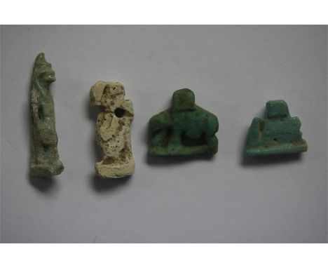 Egyptian Amulet Group, Late Period, 664-332 BC.&nbsp; A mixed group of faience amulets consisting of: two sow amulets; Horus 