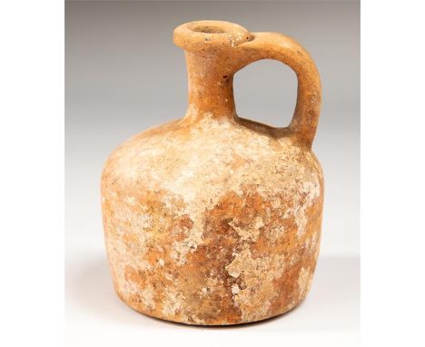 Western Asiatic single handled jug, C. 800 BC.&nbsp; A single handed ceramic jug with globular body and single handle. Ex. Lo