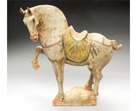 Tang Dynasty Horse Statue, 618-906 AD  A large ceramic statue of a horse, head turned to the left and looking down, mouth ope