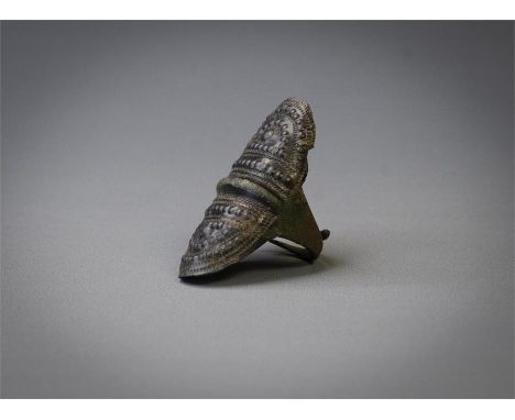 Viking Decorated Shield Ring, 9th-10th century AD  A bronze ring with open, adjustable shank. The large bezel in the shape of