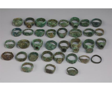 Collection of Roman Bronze Rings, C. 4th - 5th Century AD.  A group of Roman rings with varying bezels, some engraved with ge