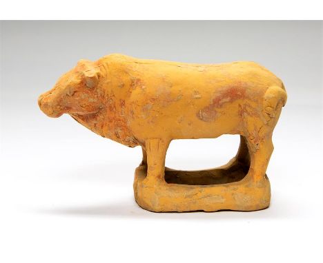 Chinese Tang Dynasty Ox Figurine, 618-907 AD  A ceramic figure of a ox with short horns, hump and dewlap; hollow body with sh