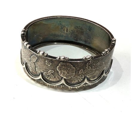 Victorian silver cuff bangle measures approx 2.8cm wide age related marks /dents as shown 