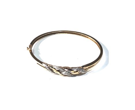 9ct gold diamond twisted design bangle weight 8.1g 