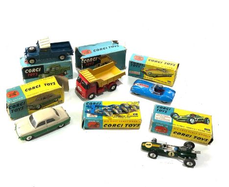 6 Boxed corgi toys play worn condition 