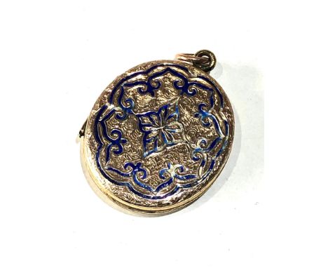 Antique gold back and front enamel locket measures approx 3.5cm drop by 2.6cm age related wear to enamel as shown 