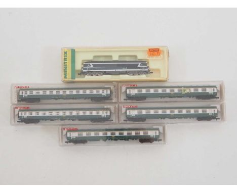 A group of MINITRIX and FLEISCHMANN French outline N gauge rolling stock comprising a BB72000 series diesel locomotive and a 