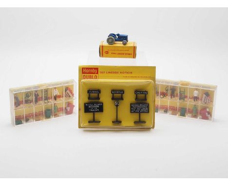 A group of DINKY and HORNBY DUBLO OO gauge accessories comprising of x2 DINKY 054 Station Personnel sets, a HORNBY DUBLO 5037