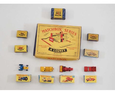 A group of MATCHBOX Regular Wheels vehicles and 6 empty boxes, comprising of a No 39c Ford Tractor,  a No 63c Ford Crane Truc