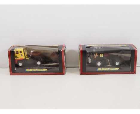 A pair of SCALEXTRIC slot racing trucks - G/VG in F/G boxes (2)