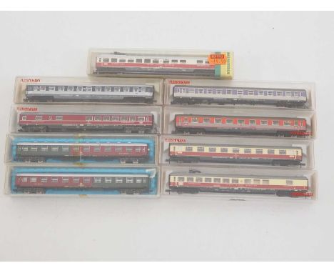 A group of N gauge German outline coaches by MINITRIX, RIVAROSSI and FLEISCHMANN - G/VG in G/VG boxes (9)
