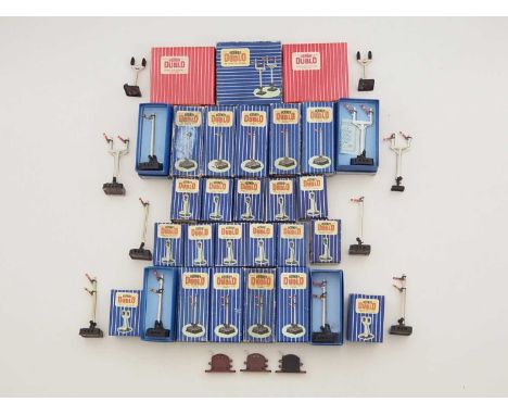A large quantity of boxed and unboxed HORNBY DUBLO OO gauge semaphore and colour light signals - G/VG in G boxes where boxed 
