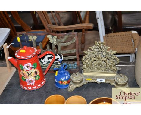An ornate desk stand, book stand, small can and enamel decorated jug