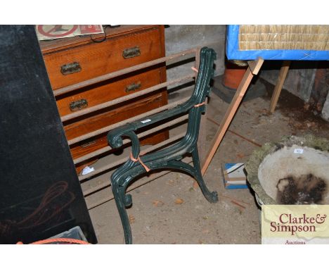 A pair of cast iron bench ends