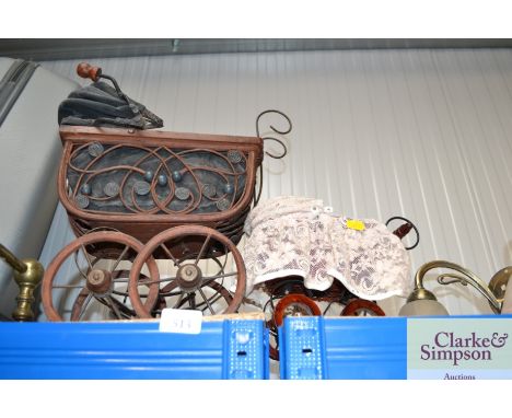 A child's vintage pram; and one other 