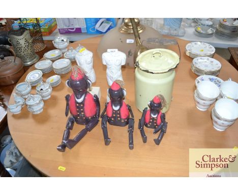 Three articulated monkeys; two torsos and a enamel storage container