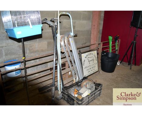 A step ladder; roof rack; curtain pole; box of various fittings; hub caps etc