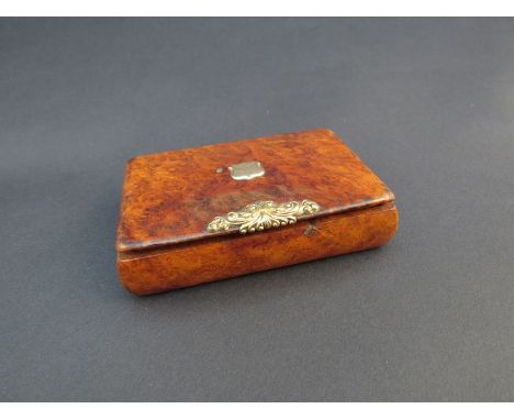 A 19th Century burr walnut snuff box with yellow metal mounts, 8cm long