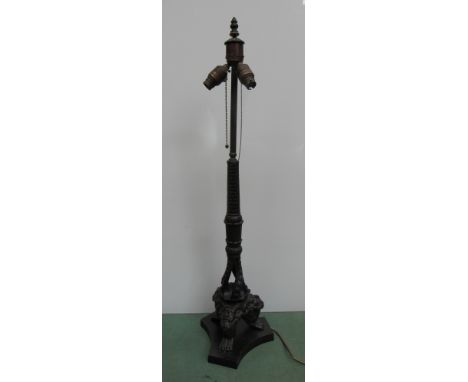 A column-form base table lamp with decorative column and mythical beast feet, 88cm tall