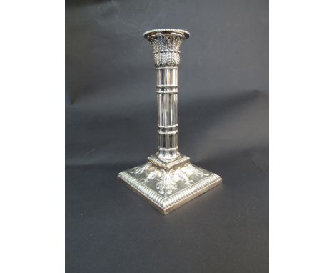A Victorian ornate silverplate candlestick of classical Architectural form, 19cm tall