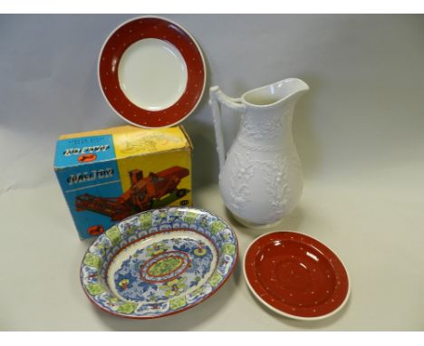 Two relief moulded stone ware jugs by William Brownfield together with a Wedgwood 'Pekin' pattern oval dish, a Buchan Portobe