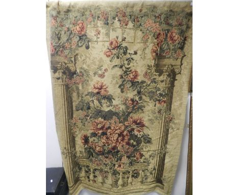 A machine woven tapestry wall hanging depicting climbing roses on a Neo Classical terrace 