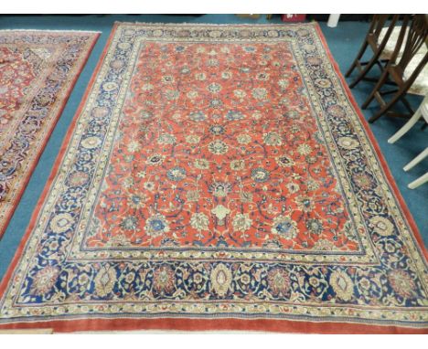 A 20th century machine woven Heriz style carpet approximately 360cm x 265cm 