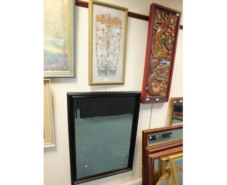 A mirror and a framed print
