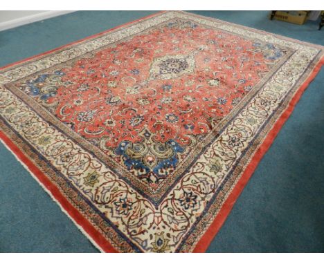 A modern Heriz style red and blue ground carpet, approx 391cm x 292cm