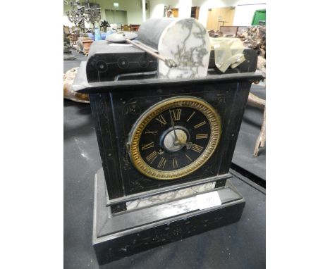 A French slate or black marble mantel clock