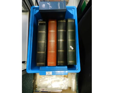 Four stock books of British and foreign stamps and an album of first day covers 