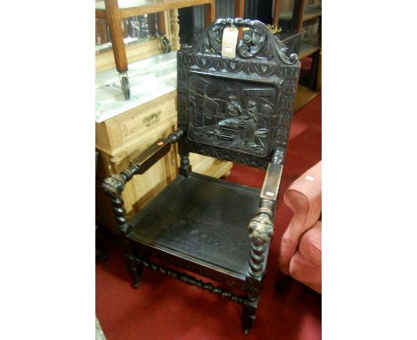 A Continental circa 1900 ebonised and heavily carved oak panel back and seat throne chair, the carved back depicting a market