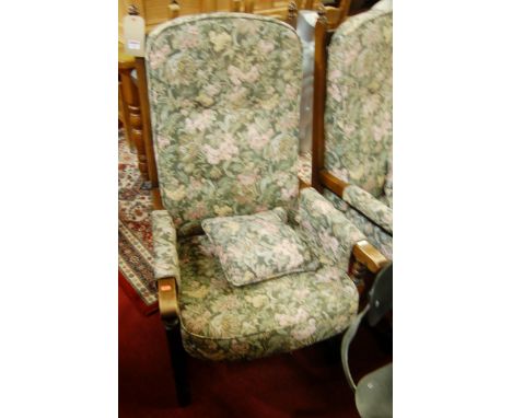 A pair of contemporary Old Charm oak framed and floral button upholstered armchairs