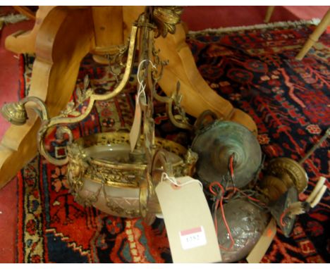 A late 19th century cast and gilt metal hanging four division ceiling light, having cut glass shade; together with two French