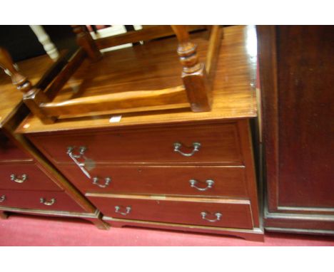 An Edwardian mahogany and chequer strung chest of three long drawers, w.84cm