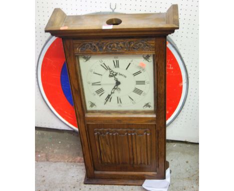 A contemporary Old Charm linenfold moulded oak drop trunk wall clock, height 81cm
