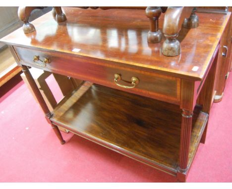 A circa 1900 Maple & Co mahogany and satinwood cross banded ledgeback two tier buffet, having single long upper drawer and ra
