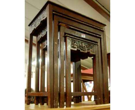 A contemporary Eastern stained hardwood nest of four occasional tables; together with an early 20th century mahogany cased se