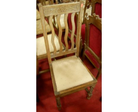 A set of three early 20th century oak pierced ladderback rush seat dining chairs, together with a pair of light oak slatback 