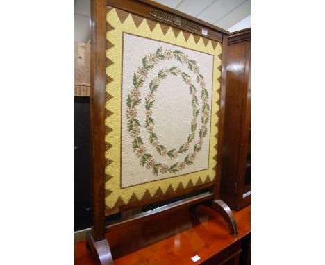 A 19th century French mahogany, gilt metal mounted, and floral tapestry inset fire screen, w.63cm