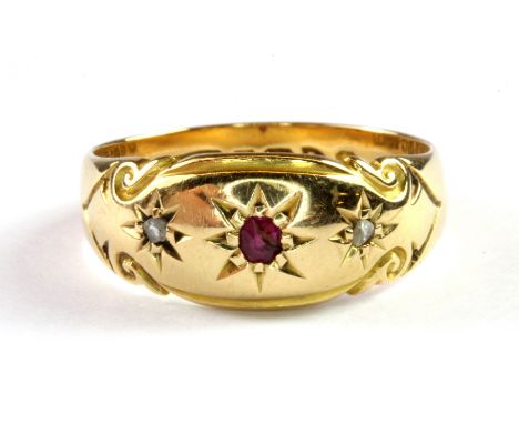 An antique 18ct yellow gold gipsy ring set with a ruby and two diamonds, (P.5).