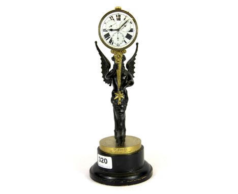 A 19th Century French bronze figural clock on a wooden plinth, H. 30cm.