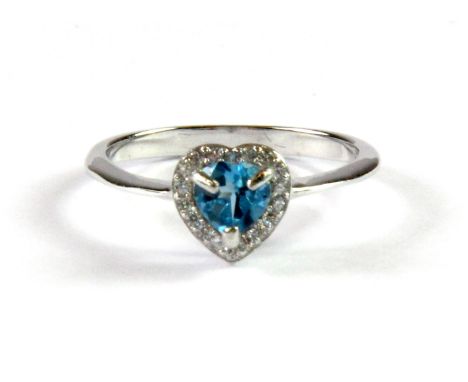 A 925 silver ring set with a heart cut blue topaz surrounded by white stones, (N).