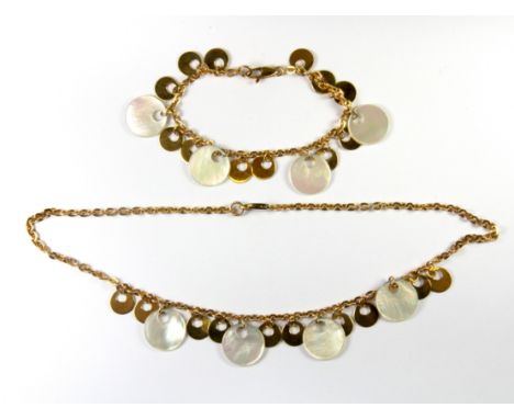 A 9ct yellow gold and mother of pearl necklace and matching bracelet.