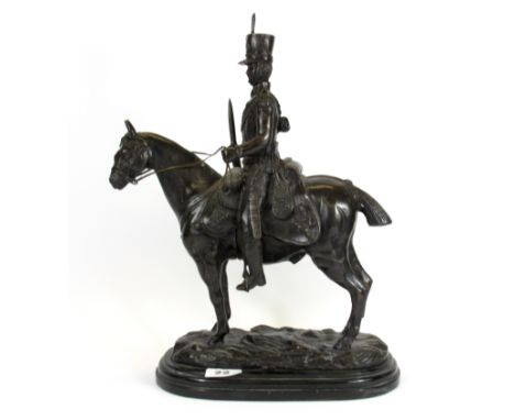 A bronze figure of a horse and soldier on a black marble base after J. R. Skeaping, H. 41cm.