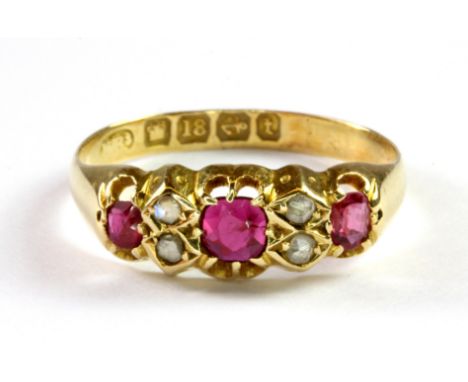 An antique 18ct yellow gold ruby and diamond set ring, (P.5).