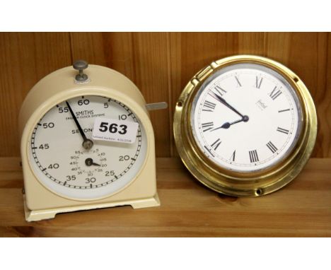 A vintage Smiths stop clock together with a Sestral alarm wall clock.