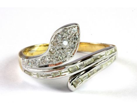 A yellow and white metal (tested 9ct gold) snake shaped ring set with diamonds, ( R ).